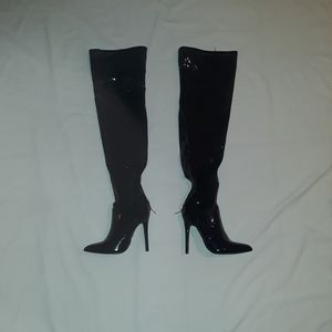 Black glossy thigh high boots